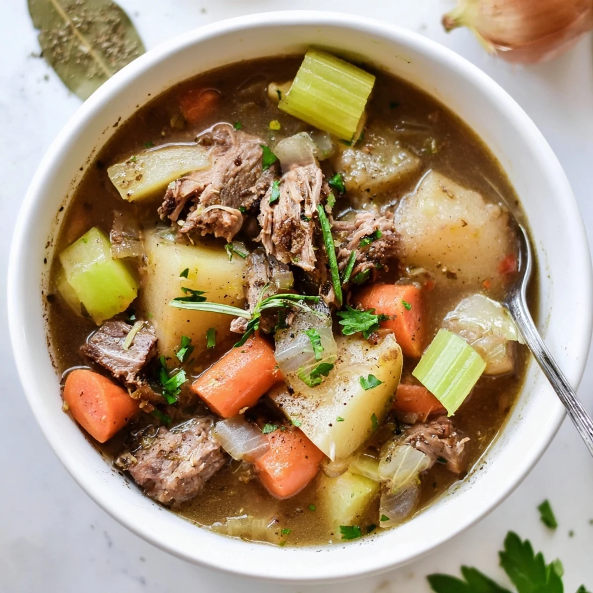 Aromatic slow cooker herb lamb stew with tender vegetables and fresh herbs.  