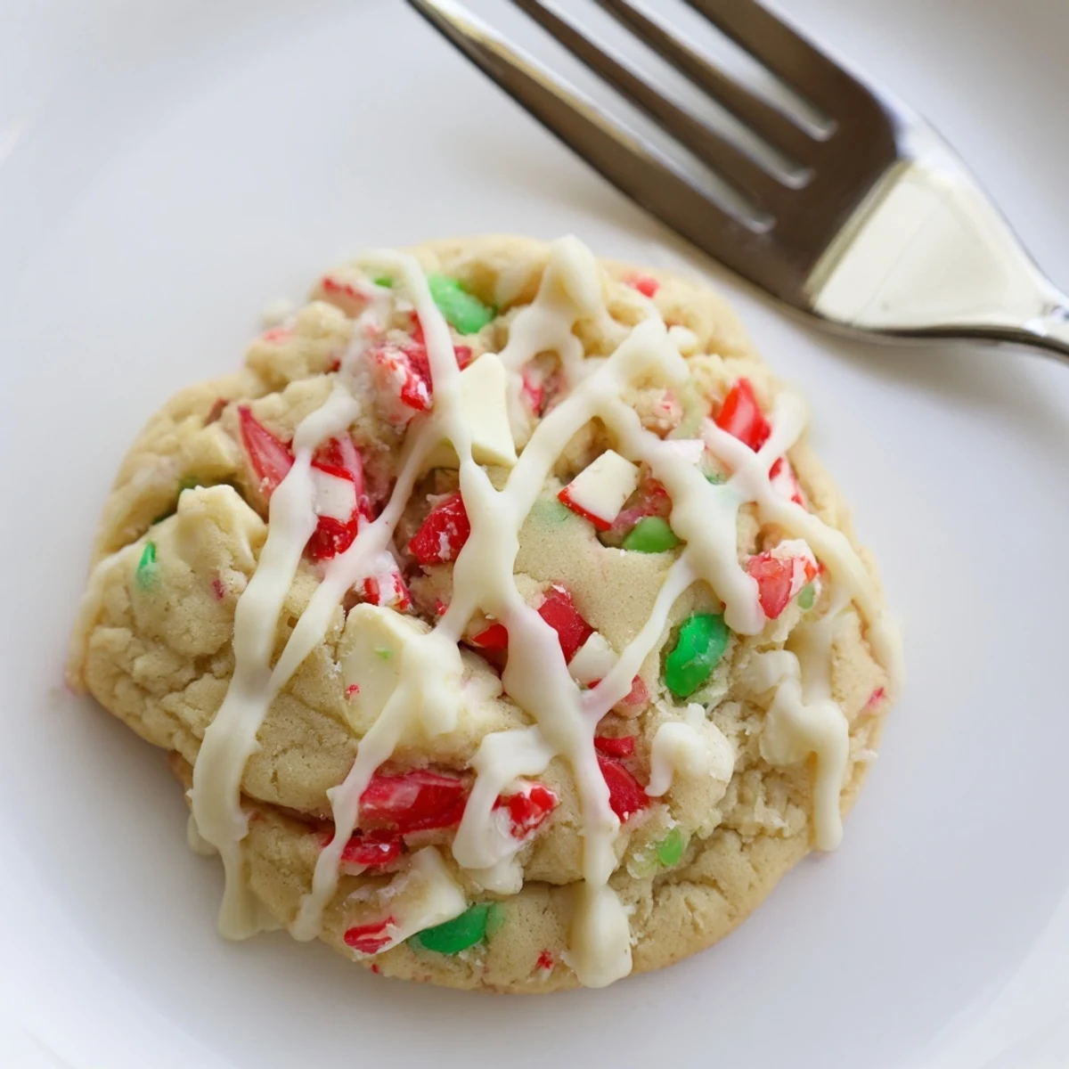 Delicious White Chocolate Peppermint Bark Cookies, fresh from the oven, with melting white chocolate and crunchy peppermint.