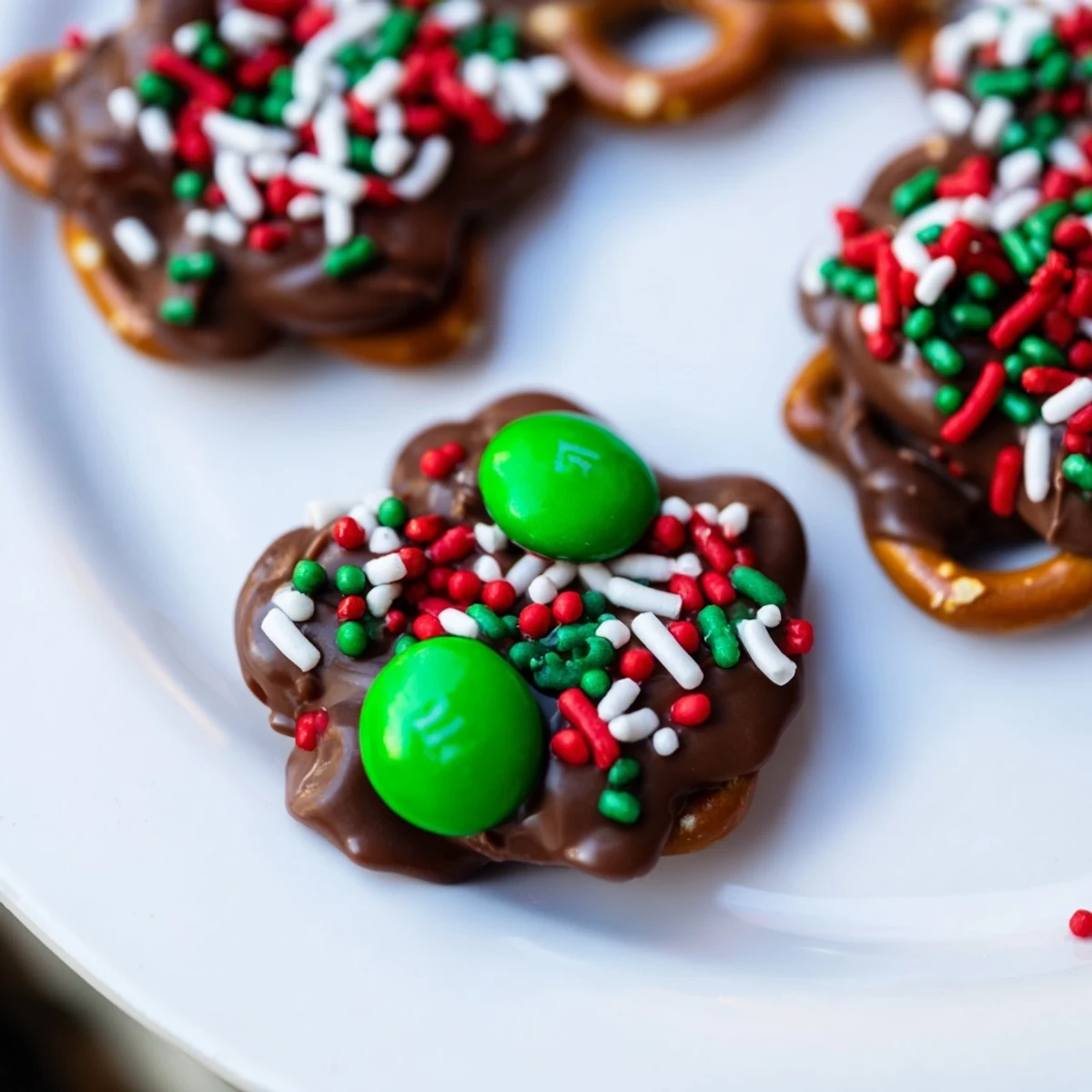 Golden brown air fryer Christmas pretzel bites, a perfect holiday treat, ready to be enjoyed with hot cocoa.