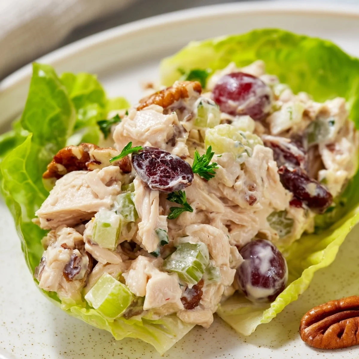 Bright and colorful Simplified Festive Chicken Salad Cups in crisp lettuce cups, ready to eat.