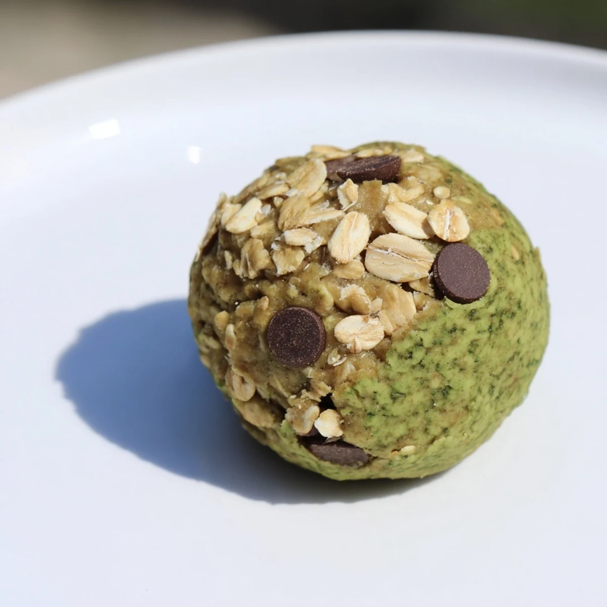 Vibrant photo of Matcha Gingerbread Cookie Dough Protein Bites, ready to enjoy as a flavorful, healthy snack.