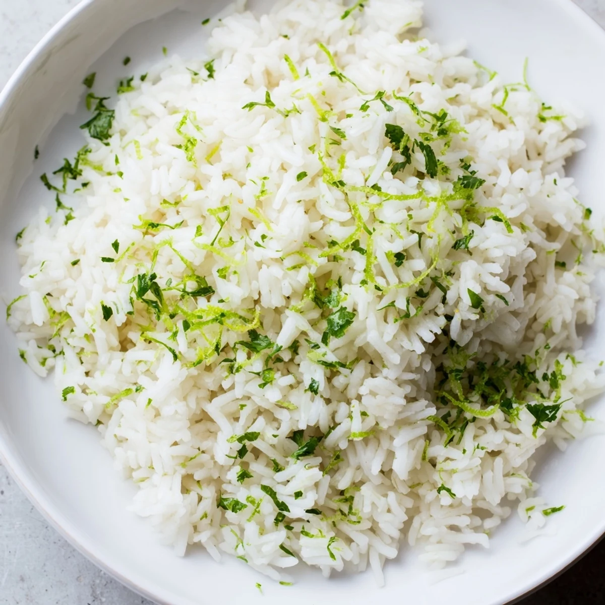 Fresh Cilantro Lime Rice, steaming and fragrant, offering a taste of zesty lime with every bite.