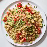A colorful bowl of quinoa power protein salad with roasted veggies, perfect for lunch.