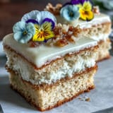 Beautiful mini spring birthday layer cakes with pastel buttercream and edible flower decorations, perfect for a festive celebration.