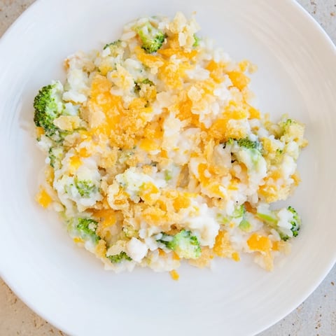 Golden, bubbly Chicken & Broccoli Rice Casserole, a family favorite with creamy sauce and cheese.