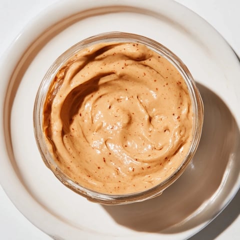 Quick Christmas Cookie Butter Spread swirled beautifully, ready to be spread on toast and enjoyed.