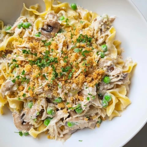 Golden-brown Tuna Noodle Casserole topped with crispy panko, ready to serve and enjoy.