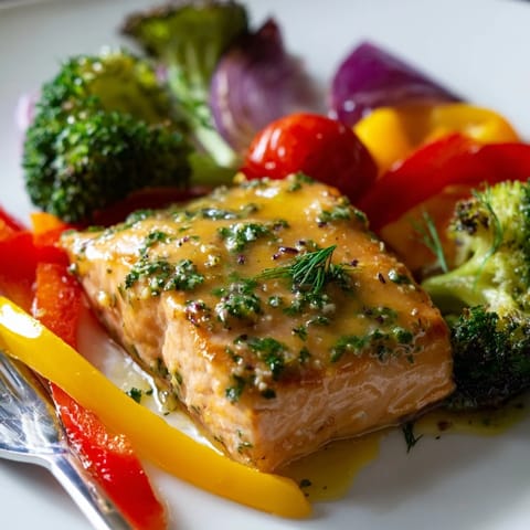 Easy Sheet Pan Lemon Herb Salmon highlights colorful veggies, perfect for weeknight dinners.  
