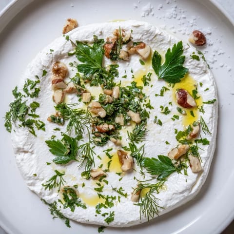 A visually appealing shot of The Fossil Record, a unique appetizer with herbal cheese "fossils".