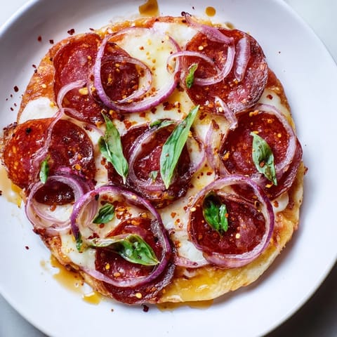 Spicy pepperoni and sweet hot honey create the perfect contrast on this delicious flatbread pizza.