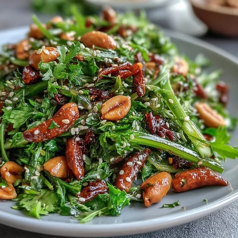 Vibrant Asian-inspired celery peanut salad with colorful bell peppers, scallions, and a zesty soy ginger dressing, served fresh and crunchy.  