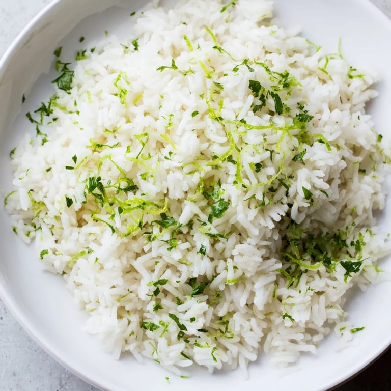 Fresh Cilantro Lime Rice, steaming and fragrant, offering a taste of zesty lime with every bite.
